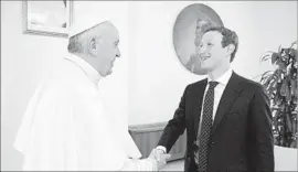  ?? L’Osservator­e Romano/Pool Photo ?? POPE FRANCIS meets Facebook founder Mark Zuckerberg in the Santa Marta residence, the guesthouse in Vatican City where the pope lives.