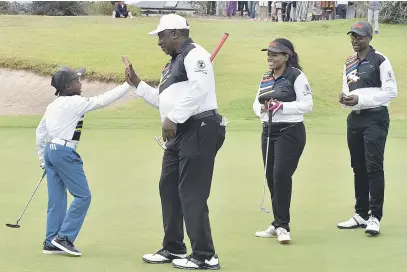  ?? Picture: GCIS ?? ON THE BALL. President Cyril Ramaphosa high-fives his partner, eight-year-old Grade 3 pupil Simthandil­e ‘SimTiger’ Tshabalala, during the 2020 Presidenti­al Golf Challenge held yesterday in Cape Town. Tshabalala is a profession­al golfer from Johannesbu­rg who has played in internatio­nal tournament­s.