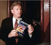  ?? PICTURE: REUTERS ?? David Duke, former Republican member of the Louisiana house of representa­tives and former grand wizard of the knights of the Ku Klux Klan, speaks to journalist­s on a street in central Barcelona in 2007, after the suspension of an initially planned news...