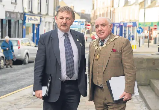  ?? Picture: Paul Reid. ?? Council leader Bob Myles, left, with Provost Ronnie Proctor after the meeting in Forfar.