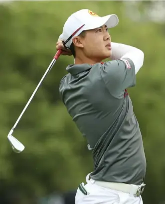  ?? Patrick Smith/Getty Images ?? Jazz Janewattan­anond is making the most of his first PGA Championsh­ip. “My expectatio­n was to come out here and have some fun and see what majors are all about.”