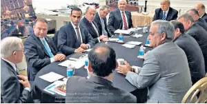  ??  ?? George Papadopoul­os, at the Montage Hotel in Beverly Hills. Left, Papadopoul­os (third left) in a photograph released on Donald Trump’s Instagram account on April 1 2016 with a caption saying it was taken during a campaign national security meeting in Washington