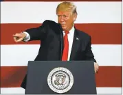  ?? JEFF ROBERSON — THE ASSOCIATED PRESS ?? President Donald Trump gestures while speaking about tax reform Wednesday in Springfiel­d, Mo, He said his vision for re-writing the tax system would unlock stronger economic growth and benefit companies and workers alike.