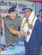  ?? ?? CPI-Maoist rebels surrender before security forces in Chaibasa town in West Singhbhum on Thursday.