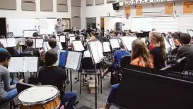  ?? Pin Lim / For the Chronicle ?? Band students practice at Salyards Middle School.