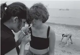  ??  ?? Carol, Nancy, and Julia at Manhattan Beach, 1978; photograph by Susan Meiselas from ‘Prince Street Girls, 1976–1979,’ a recent exhibition at Higher Pictures, New York City. The catalog is published by TBW Books.