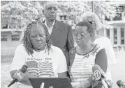  ?? Gregg Vigliotti / New York Times ?? Deborah Danner’s sister, Jennifer, left, addresses the media alongside relatives and friends near the building in the Bronx where Danner was fatally shot.