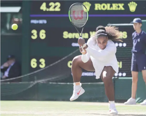  ?? BEN CURTIS/AP ?? Serena Williams smacks a backhand during her come-from-behind victory Tuesday against Camila Giorgi in the women’s quarterfin­als at Wimbledon.