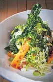  ?? MICHAEL BAUERDinin­g
Out
John Storey / Special to The Chronicle ?? The roasted butternut squash and kale salad at the Thomas restaurant in Napa.