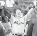  ?? PAUL SANCYA/AP ?? Garrett Cooper celebrates his solo home run during the sixth inning of the Marlins’ win over the Tigers on Wednesday night in Detroit.