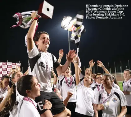  ??  ?? Hibernians' captain Dorianne Theuma (C) holds aloft the BOV Women's Super Cup after beating Birkirkara 3-0. Photo: Domenic Aquilina