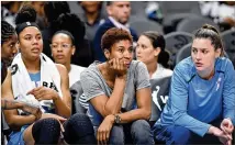  ?? HYOSUB SHIN / HSHIN@AJC.COM 2019 ?? Former Dream star Angel McCoughtry (center), who now plays for the Las Vegas Aces, has led a campaign to honor women who were victims of police brutality.