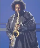  ??  ?? Kamasi Washington’s jazz style is touched by his influences from hip-hop and R&B