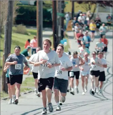  ?? Freeman file photo ?? More than 500 runners will once again make their way through the streets of uptown Kingston for the Kingston Classic.