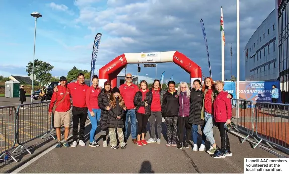  ?? ?? Llanelli AAC members volunteere­d at the local half marathon.