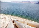  ??  ?? This file photo, shows pipes extending into Lake Mead well above the high water mark near Boulder
City, Nevada. (AP)