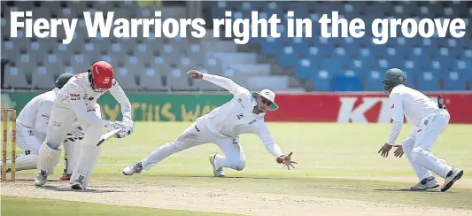  ?? Picture: MARK ANDREWS ?? STRETCHING OUT: Lions' Rassie van der Dussen feeling a little cramped for space in the crease against the Warriors at Buffalo Park on Saturday