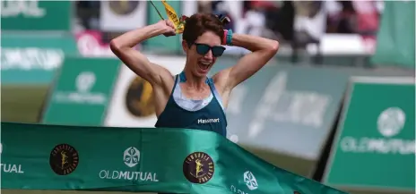  ??  ?? IT’S REALLY HAPPENING: Ann Ashworth wins the Womens Comrades Marathon yesterday. “I don’t think there is anybody more surprised than me,” she said.