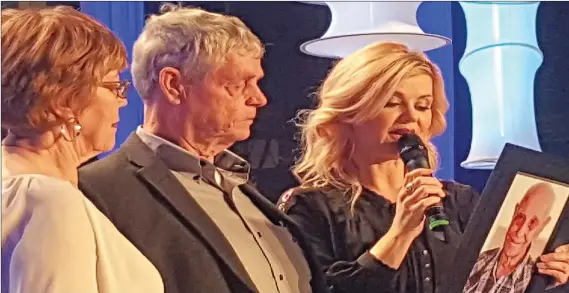  ??  ?? Gail Stevenson and Ken Wills were on the Telemiracl­e 41 stage with Beverley Mahood on March 5 during the unveiling of a $463,000 donation from their Uncle Harold Hanson’s estate.