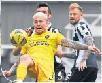  ??  ?? Livi’s Lyndon Dykes in the thick of it