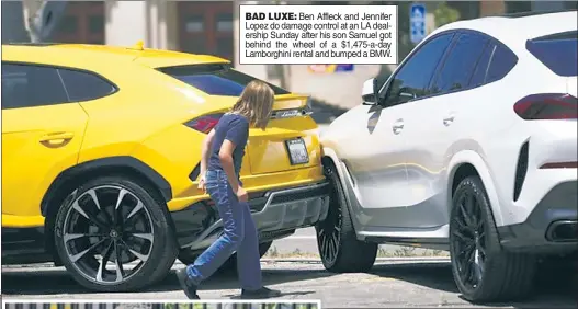  ?? ?? BAD LUXE: Ben Affleck and Jennifer Lopez do damage control at an LA dealership Sunday after his son Samuel got behind the wheel of a $1,475-a-day Lamborghin­i rental and bumped a BMW.