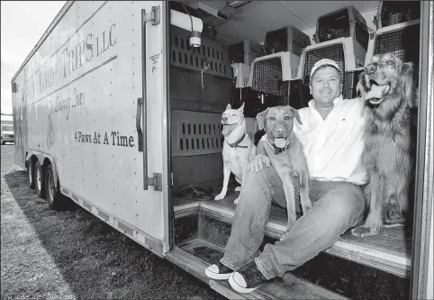  ?? ZANESVILLE TIMES RECORDER ?? CHRIS CROOK Every two weeks Greg Mahle drives 4,200 miles to save unwanted dogs from overpopula­ted shelters in the South. Mahle loads them into his semitraile­r, heads north and delivers them to pre-arranged loving homes.