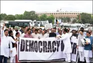  ?? ?? Leader of Opposition in Rajya Sabha Mallikarju­n Kharge with Leader of Congress in Lok Sabha Adhir Ranjan Chowdhury and Opposition MPS take out a protest march from Parliament to Vijay Chowk demanding a JPC inquiry into the Adani Group issue, in New Delhi, on 24 March 2023. ANI