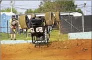  ?? SUBMITTED PHOTO - CARL HESS ?? Mike Bednar gets flipped during a race at Action Track USA on May 25. Bednar returned to racing later in the evening and placed fourth in the A main event.