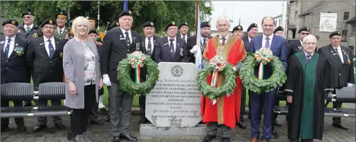  ??  ?? ONE Wreath Laying. After 12 Mass on Sunday in (Rowe Street) there were wreaths layed by Paul Kehoe Minister for State, Cllr Jim Moore Mayor of Wexford and Larry Shannon Parades Officer ONE at the stone monument in the Faythe.