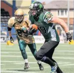  ?? Tim Furfie ?? Halton Spartans defensive back Charlie Nash looks to advance with the ball after picking off a pass in the game against the Phantoms.