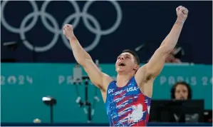  ?? (AP Photo/charlie Riedel) ?? Paul Juda, of United States, celebrates after competing on the floor exercise Saturday during a men’s artistic gymnastics qualificat­ion round at the 2024 Summer Olympics in Paris, France.