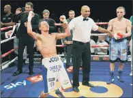  ?? PICTURE: JONATHAN GAWTHORPE ?? DONE IT: Josh Warrington celebrates retaining his Commonweal­th crown and winning the British title.