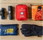  ?? ?? Always be prepared by carrying items such as a first aid kit, emergency blanket, torches and gloves – and if you’re venturing off the beaten track, don’t forget a map and compass.