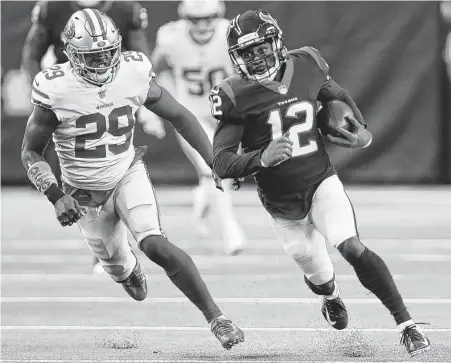  ?? Photos by Brett Coomer / Staff photograph­er ?? Texans wide receiver Bruce Ellington, right, runs past 49ers safety Jaquiski Tartt on a 37-yard reception during the first quarter.