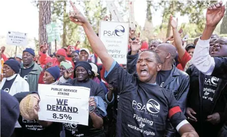  ?? Picture: Siphiwe Sibeko/Reuters ?? Public servants including teachers take part in a strike over wages. The 2023 medium-term budget policy statement raised the public sector wage bill alone by a cumulative R43bn over the next three years to account for the new wage agreement.