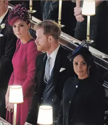  ?? GETTY IMAGES OWEN HUMPHREYS THE ASSOCIATED PRESS ?? Kate, Duchess of Cambridge, Prince Harry and Meghan, Duchess of Sussex attend the wedding.