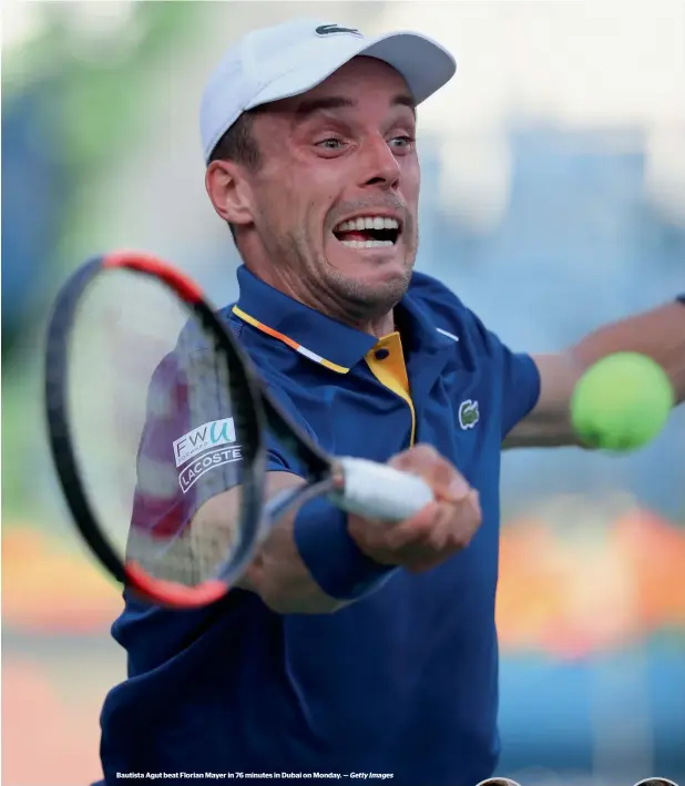  ?? Getty Images ?? Bautista Agut beat Florian Mayer in 76 minutes in Dubai on Monday. —
