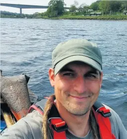  ??  ?? Open water Piotr Gudan out on a litter-pick of the Tay in 2018