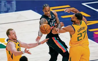  ?? Rick Bowmer / Associated Press ?? Demar Derozan and the Spurs might want to emulate the Utah Jazz, who’ve methodical­ly built a contender over the past several seasons by adding the likes of sharpshoot­ing forward Joe Ingles, left, and All-star center Rudy Gobert.