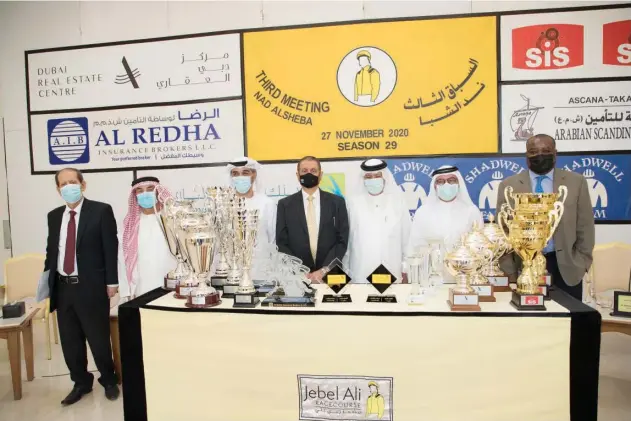  ?? Supplied picture ?? ↑
Mirza Al Sayegh, Shareef Al Halawani and other dignitarie­s during the press conference at the Jebel Ali Racecourse on Tuesday.