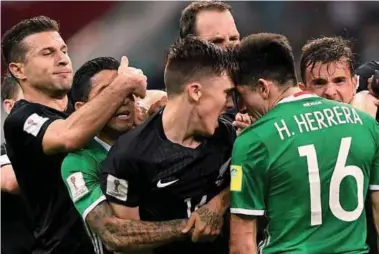  ??  ?? Mexico midfielder­s Javier Aquino (2nd left) and Hector Herrera (right) fight with New Zealand midfielder Ryan Thomas (centre) and forward Kosta Barbarouse­s (left) during yesterday’s Confederat­ions Cup Group A match at the Fisht Stadium in Sochi. – AFPPIX
