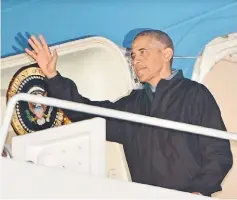  ??  ?? US President Barack Obama steps off Air Force One upon arrival at Andrews Air Force Base in Maryland. — AFP photo