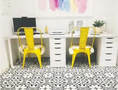  ?? JEN MCDONALD ?? Designer Jen Mcdonald chose an ornate black, white and grey cement square tile for her laundry room, which now acts as an office, classroom and craft room. Mcdonald says the bonus is it's easy to clean.