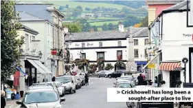  ??  ?? > Crickhowel­l has long been a sought-after place to live