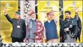  ?? ANI ?? PM Narendra Modi, along with Himachal Pradesh governor Rajendra Arlekar, CM Jai Ram Thakur and Union minister Anurag Thakur, at an event in Mandi on Monday.