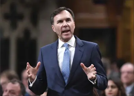  ?? JUSTIN TANG, THE CANADIAN PRESS ?? Minister of Finance Bill Morneau rises during Question Period in the House of Commons on Parliament Hill on Monday.