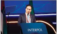  ?? AP/South Korea National Police Agency ?? South Korea’s Kim Jong Yang speaks Wednesday at the 87th Interpol General Assembly in Dubai, United Arab Emirates.