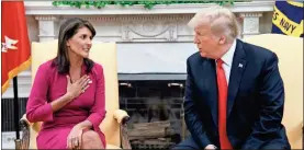  ?? / AP-Evan Vucci ?? President Donald Trump meets with U.S. Ambassador to the United Nations Nikki Haley in the Oval Office of the White House in Washington on Tuesday.