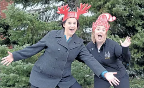  ?? MICHELLE ALLENBERG/ WELLAND TRIBUNE ?? Stephanie Hicks, executive director of the Downtown BIA, and Sarah Ane, Welland’s community developmen­t/ volunteer co- ordinator, are looking forward to kicking off the holiday season with the Welland Santa Claus Parade Saturday afternoon.