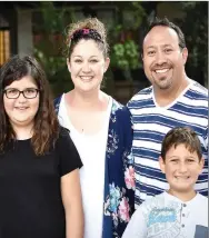  ??  ?? Mario Gonzales and his wife Stacy, and two children, Sophia and Steven.